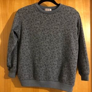 Blue sweater with black small flower pattern